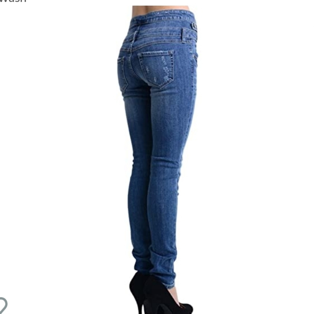high-waisted distressed skinny jeans multi-button fly slim fit leg Junior 1